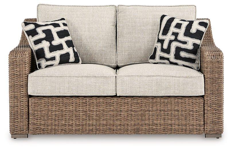 Beachcroft Outdoor Loveseat with Cushion - Joseph's Furniture (East Orange, NJ)
