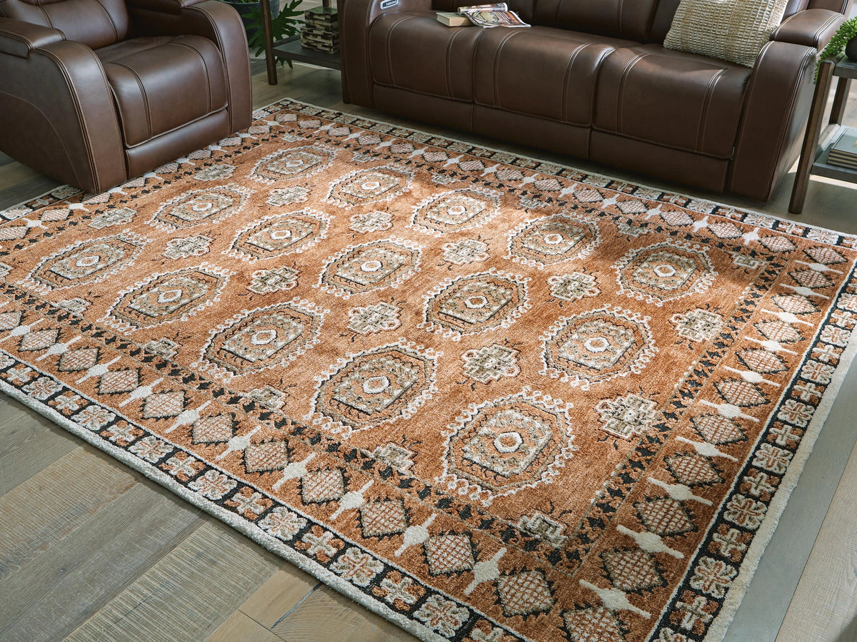 Qaabiz Area Rug